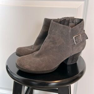 Gray suede shoe boots size 7.  Heels is 2 inches.  Zip closure.  Gently worn.